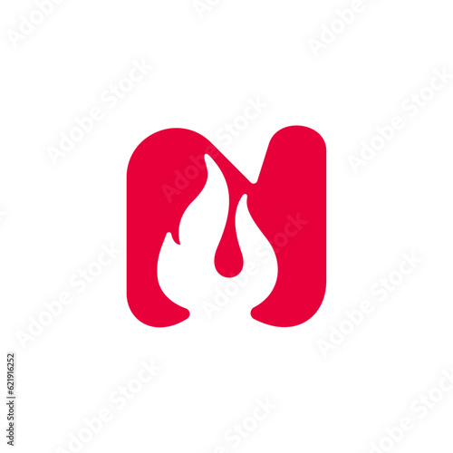 N letter logo with fire flames. Negative space vintage icon. Burning fast speed emblem. Vector for sport team wear, danger race posters, victory identity, camping labels, motorcycle customize company.