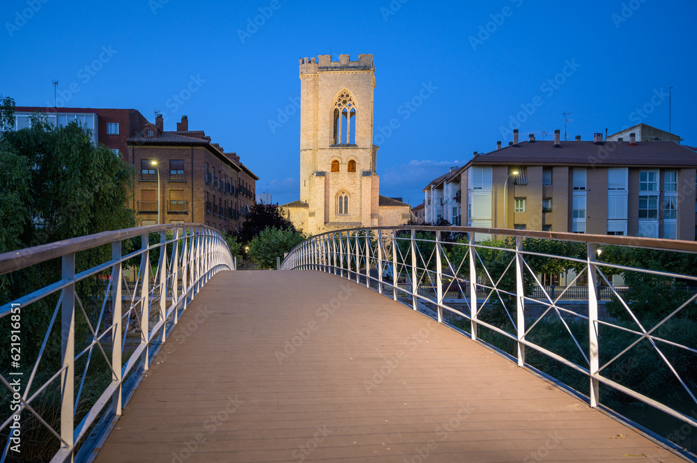 A Summer Evening Stroll - Crossing the Footbridge to the Church of St. Michael in Palencia, Spain