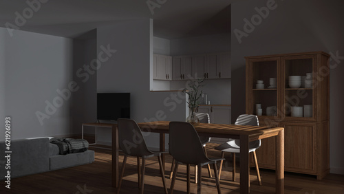 Dark late evening scene  modern scandinavian dining and living room. Wooden table with chairs  partition wall over kitchen. Cabinets and sofa. Minimal interior design