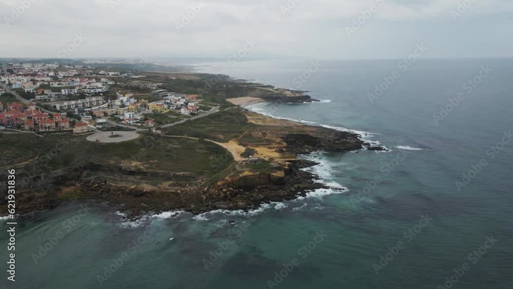 Aerial view of Sao Lourenco, a small town on the cliffs along the Atlantic Ocean coastline, Lisbon, Portugal. Aerial view of Sao Lourenco, a small town on the cliffs along the Atlantic Ocean coastline, Lisbon, Portugal.