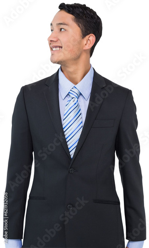 Digital png photo of happy asian businessman looking sideways on transparent background