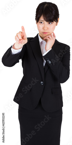 Digital png photo of insecure asian businesswoman showing index finger on transparent background