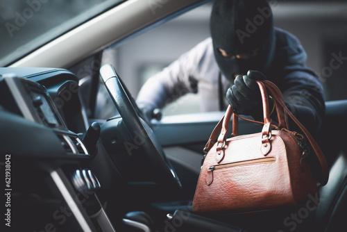 Thieves are stealing wallets in the car.