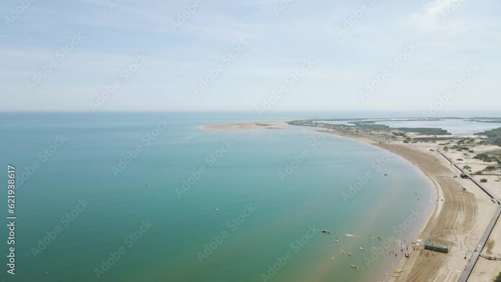 Aerial view of Delta de l'Ebre national park along the Mediterranean Sea, Deltebre, Tarragona, Spain. Aerial view of Delta de l'Ebre national park along the Mediterranean Sea, Deltebre, Tarragona, Spain.