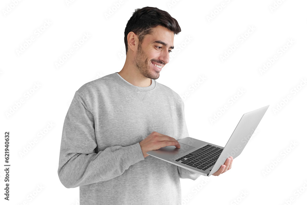Young man in gray sweatshirt holding laptop and smiling - obrazy, fototapety, plakaty 