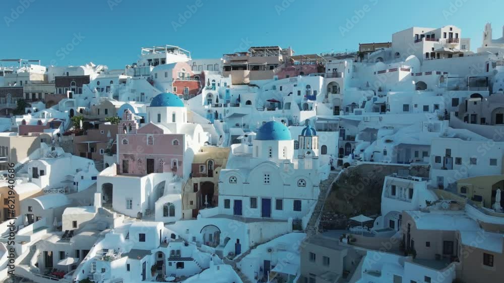 Aerial view of white houses and blue domed churches, Santorini Aerial view of white houses and blue domed churches, Santorini