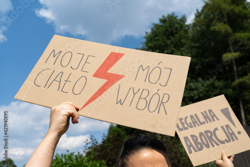 Abortion rights protest in Poland. Women's Strike rally demonstration after death of young pregnant woman. Placard signs, Moje ciało, mój wybór is My body, my choice. Legalna aborcja is legal abortion