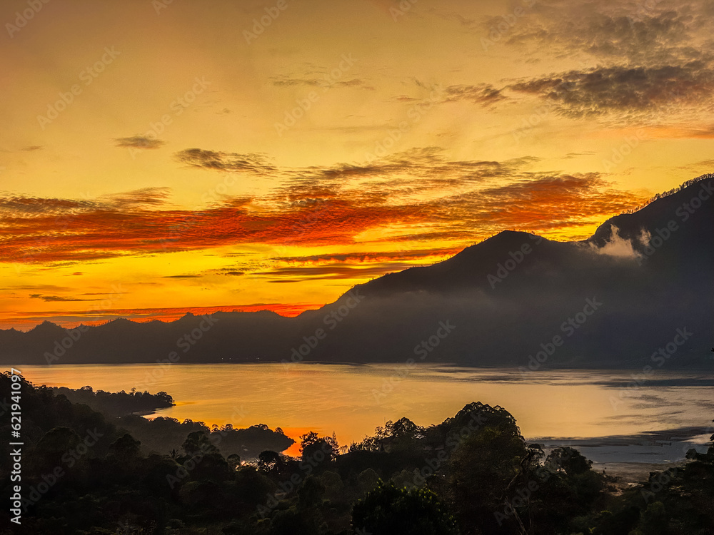 Stunning view on mount Abang  and lake Batur at sunrise