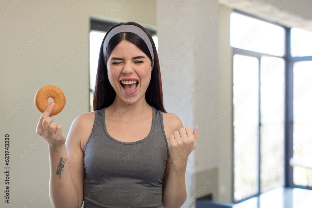pretty young woman looking angry, annoyed and frustrated. donut concept pretty young woman looking angry, annoyed and frustrated. donut concept