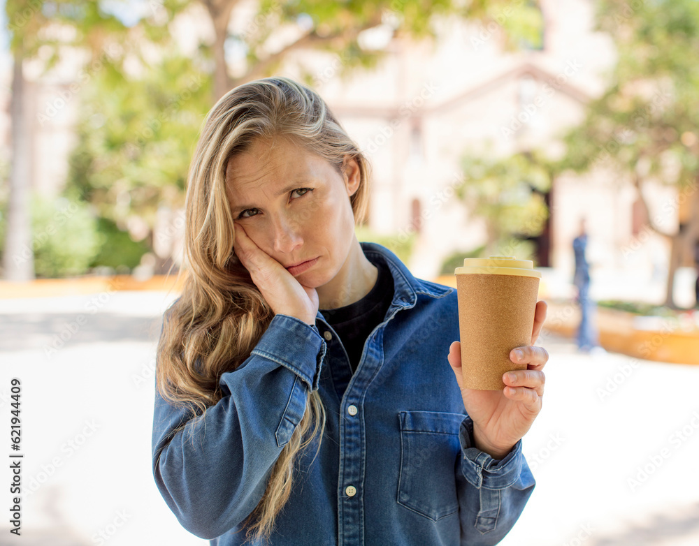 feeling bored, frustrated and sleepy after a tiresome. take away coffee concept feeling bored, frustrated and sleepy after a tiresome. take away coffee concept