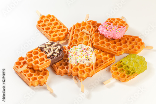 Wallpaper Mural Waffles on a white table. Fresh waffles breakfast, Belgian Waffles snack with dripped Assorted Sweet on white background. Torontodigital.ca