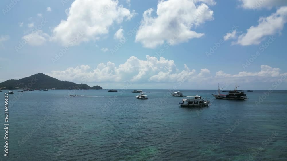 Aerial view of many boats along Sairee beach on Ko Tao island, Thailand. Aerial view of many boats along Sairee beach on Ko Tao island, Thailand.