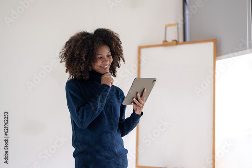 Portrait of pregnant businesswoman still working Discuss work at a meeting along with sharing meetings online as well photo