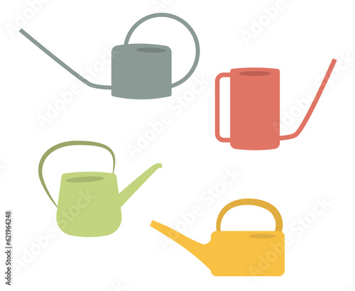 Set of colorful garden watering cans