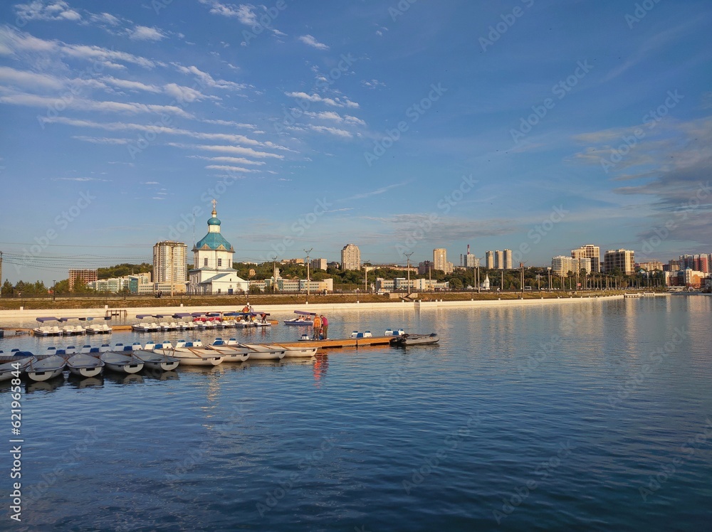 Russia, Republic of Chuvashia, Cheboksary, August 2021: Church of the Assumption of the Blessed Virgin Mary and view of Cheboksary Bay