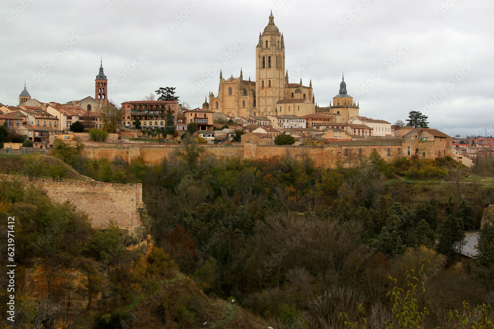 Panoramic view of the historic part of the city with the Cathedral in the center of the photo against a stormy sky in the city of Segovia, near Madrid, Spain