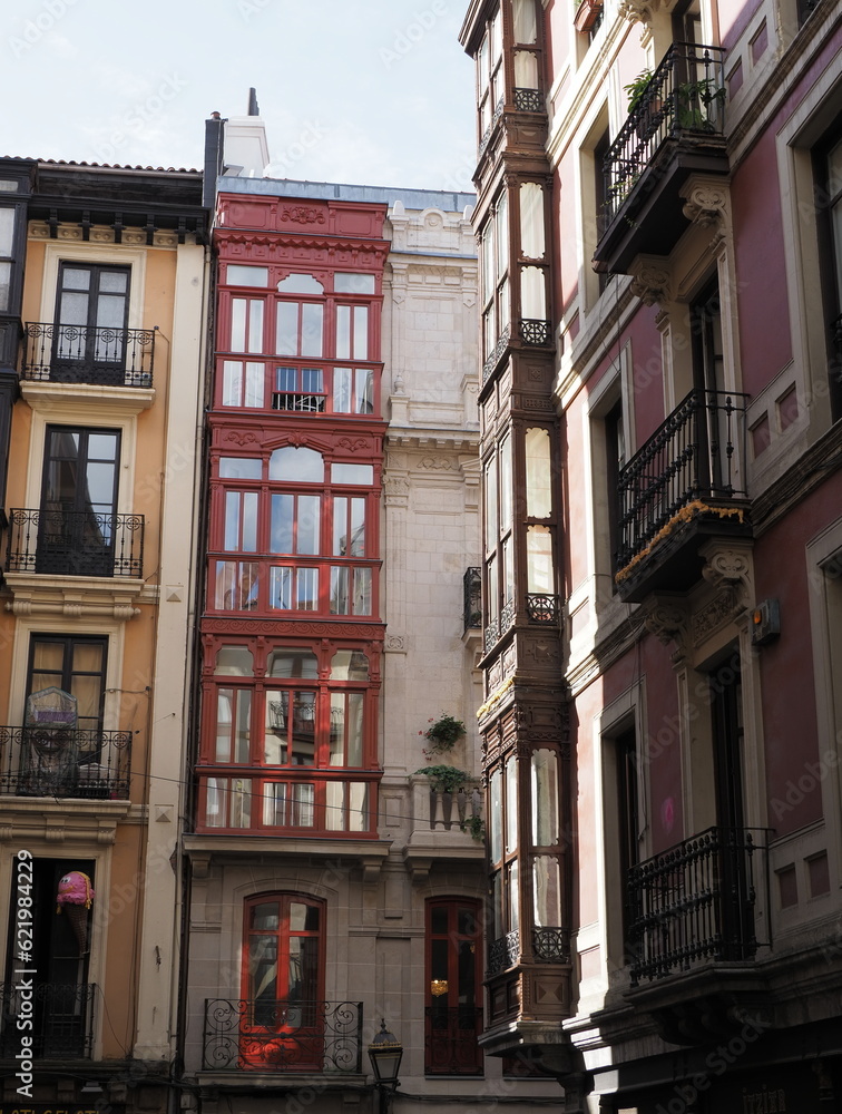 Elevation of colored houses in Bilbao city in Spain - vertical