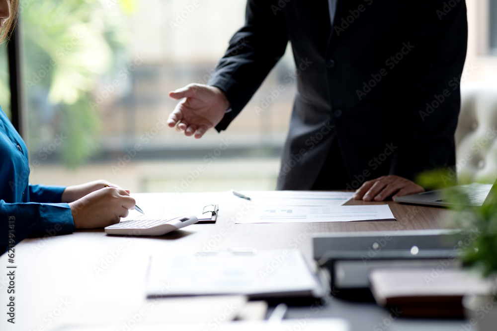 businessman executive is pointing with his hand for businesswoman businessman executive is pointing with his hand for businesswoman