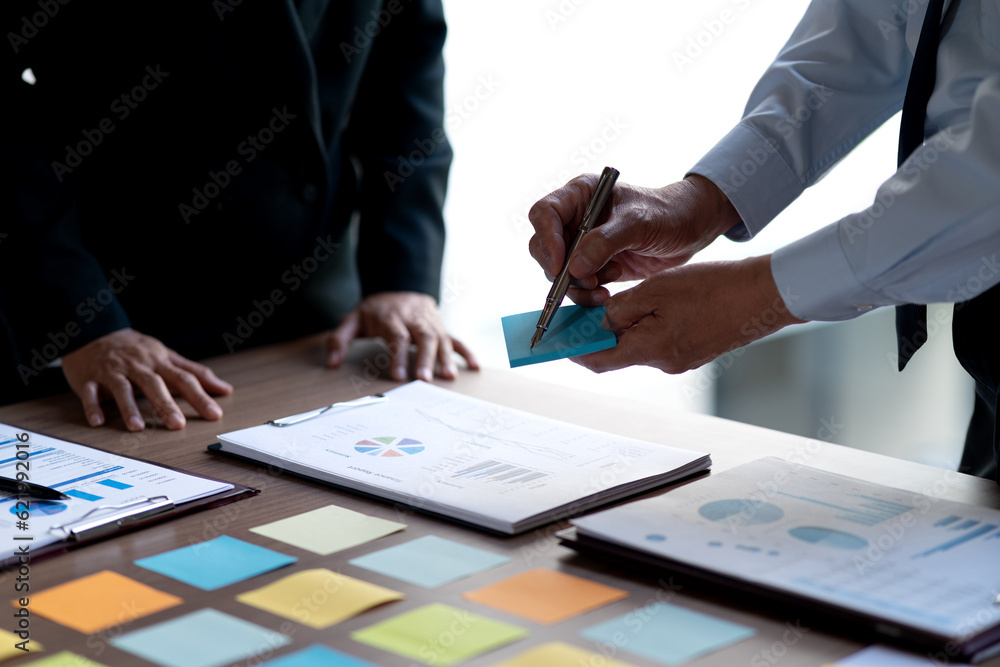marketing plans manager write note on sticky paper to show idea marketing plans manager write note on sticky paper to show idea