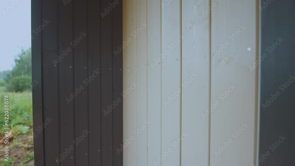 Exterior finishing of a frame house, finishing of a new house Exterior finishing of a frame house, finishing of a new house