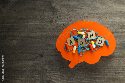 Paper brains with tangled thread, pills and letters with space for text