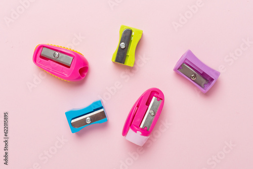 Different sharpeners on color backgroung, top view