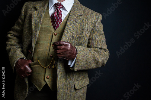 Portrait of Gentleman in Tweed Suit and Leather Gloves. Vintage Style and Retro Fashion of British Gentleman.