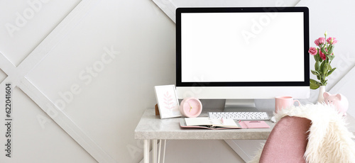 Stylish workplace with mode...