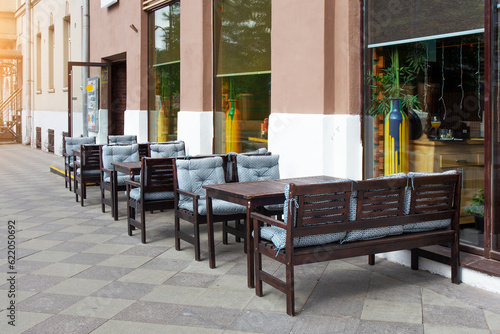 Tables and chairs in outdoor empty cafe in Moscow  Russia