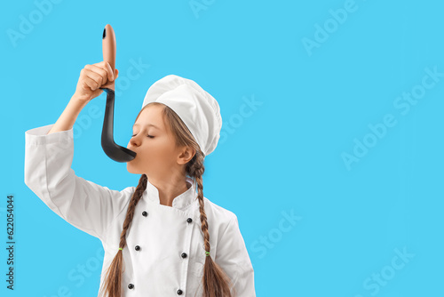 Little chef with ladle on b...