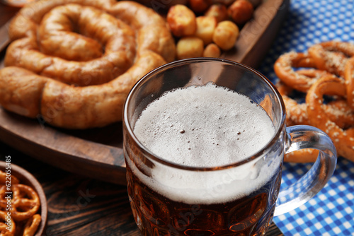 Mug of cold beer on table. Oktoberfest celebration