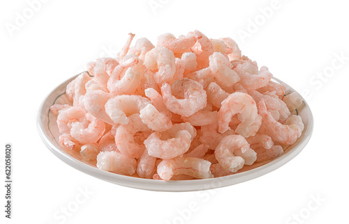 Heap of frozen boiled shrimps on a plate cutout. Plate of cooked peeled prawn tails isolated on a white background. Frozen shrimps prepared for cooking. Seafood recipe.
