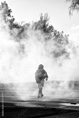 Santiago  Chile - October 18  2022 - police walking through tear gas