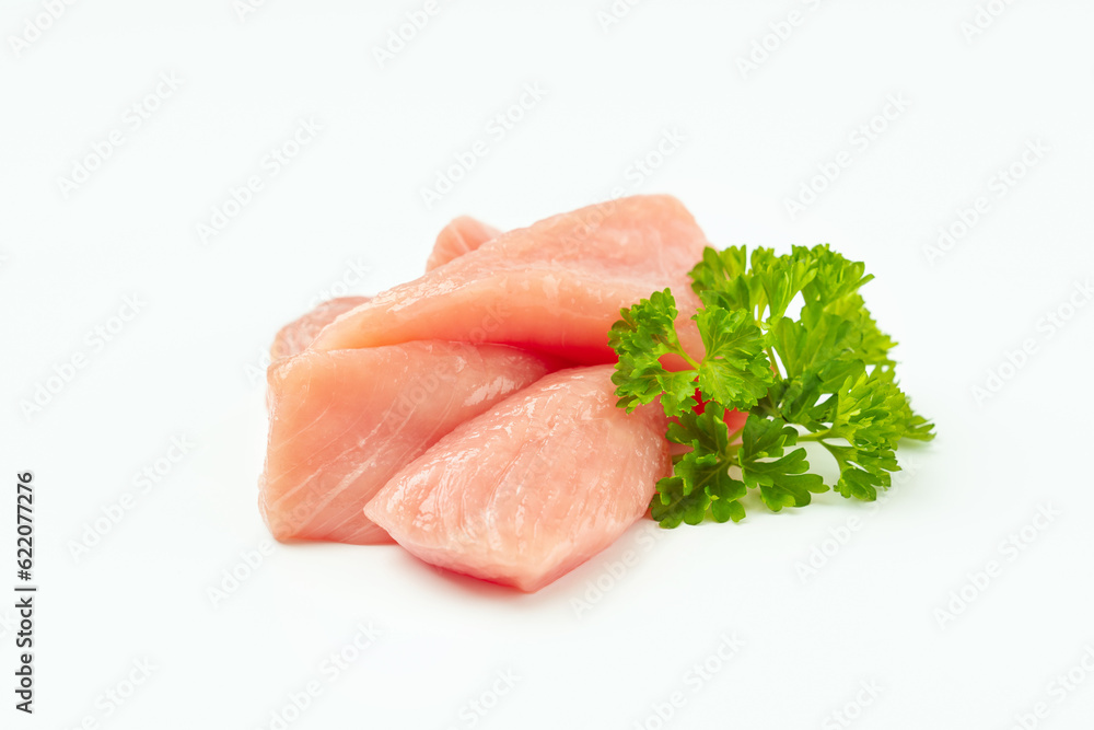 Fresh pieces of turkey meat on a white background.Ogranic food and healthy eating.Frozen chicken fillet.Raw chicken.Chicken Skewers breast fillet meat Fresh pieces of turkey meat on a white background.Ogranic food and healthy eating.Frozen chicken fillet.Raw chicken.Chicken Skewers breast fillet meat