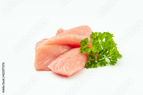 Fresh pieces of turkey meat on a white background.Ogranic food and healthy eating.Frozen chicken fillet.Raw chicken.Chicken Skewers breast fillet meat