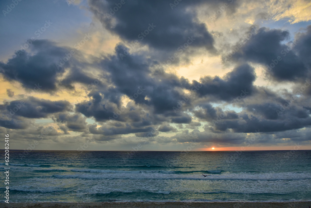 Caribbean beach at Cancun, Mexico, very early in the morning time, sunrise