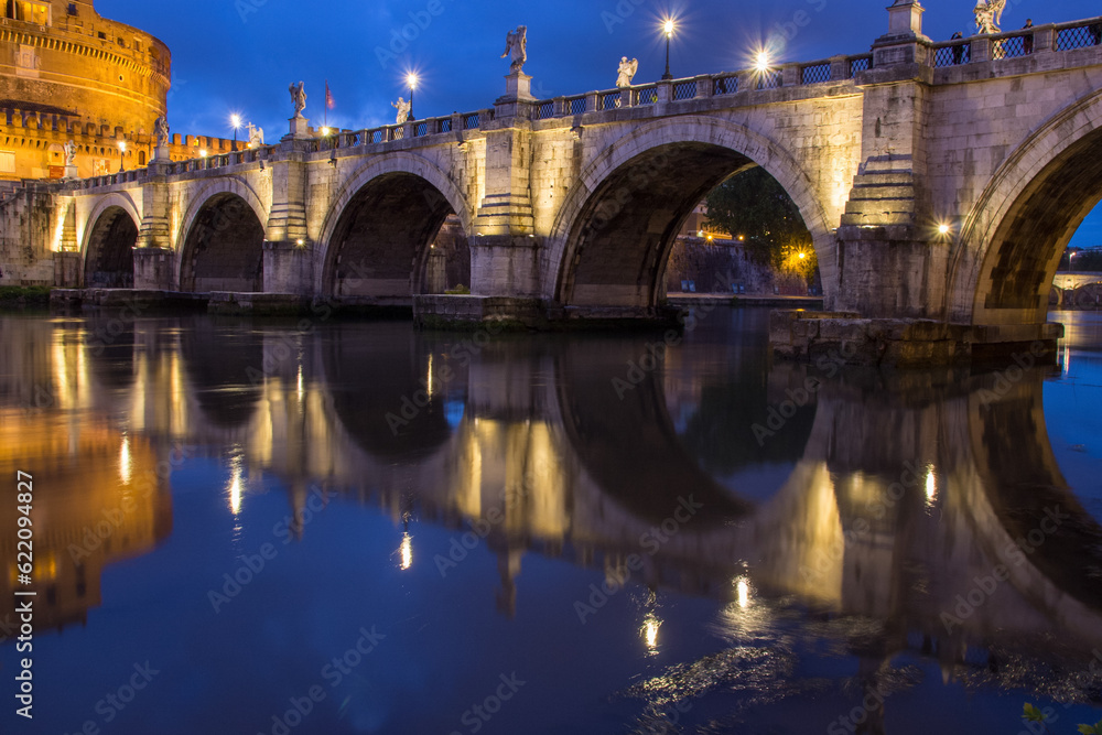Castel Sant' Angelo and Ponte Sant' Angelo reflecting onto the River Tiber at twilight, Rome, Italy, Europe