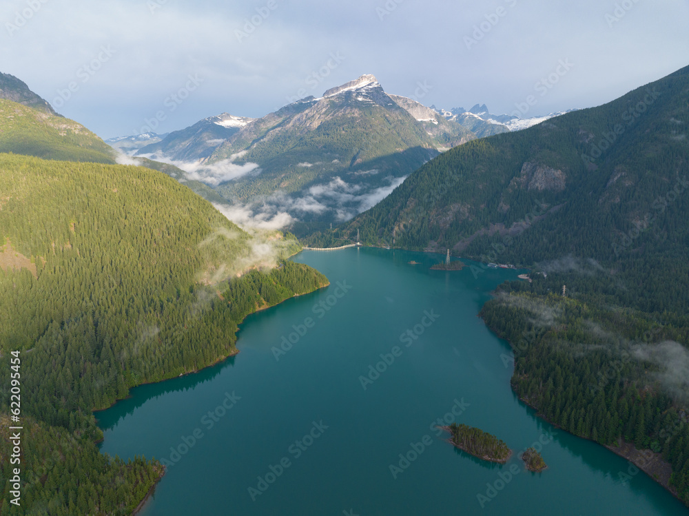 Rugged, forest-covered landscape surrounds Diablo Lake in North Cascades National Park. This mountainous region of northern Washington is absolutely beautiful and easily accessed during summer months.