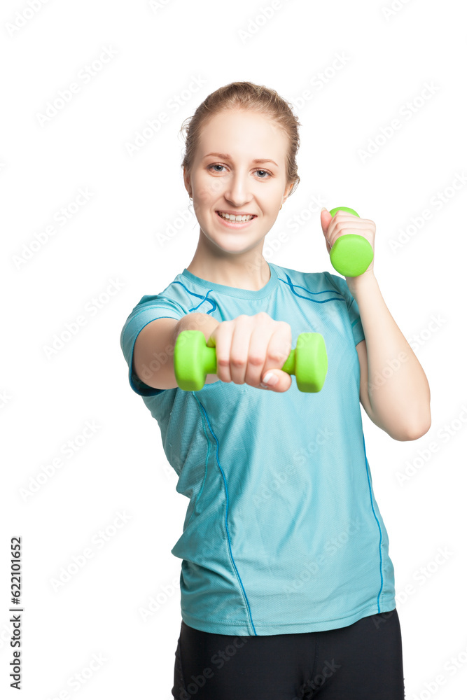 Athletic young woman works out with green dumbbells, isolated on white