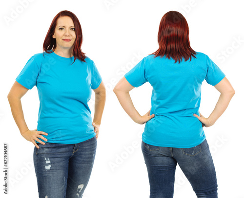 Fotografie Photo of a woman posing with a blank light blue t-shirt and red hair, ready for your artwork or design