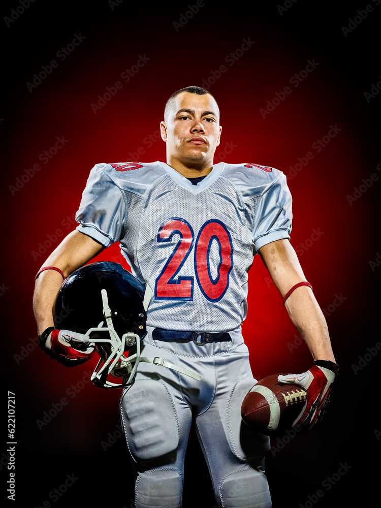 one american football player man isolated on colorful black background one american football player man isolated on colorful black background