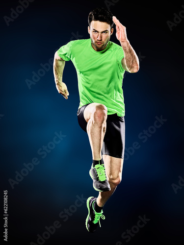 one caucasian man runner running jogger jogging isolated on black background © Designpics