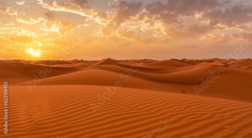 majestic dry desert with a beautiful sunset with clouds in high resolution and sharpness © Marco