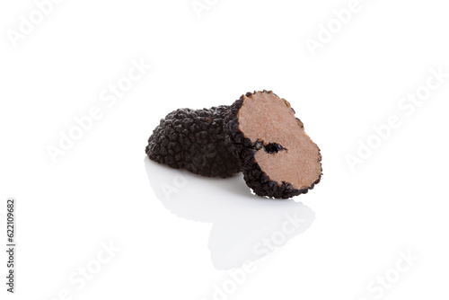 Cut truffles isolated on white background. Luxurious culinary cooking ingredienets.