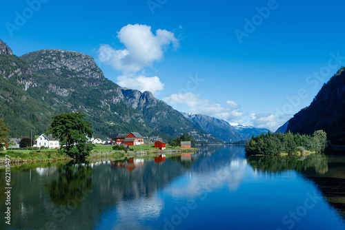 Beautiful Nature Norway natural landscape with red fishing houses.