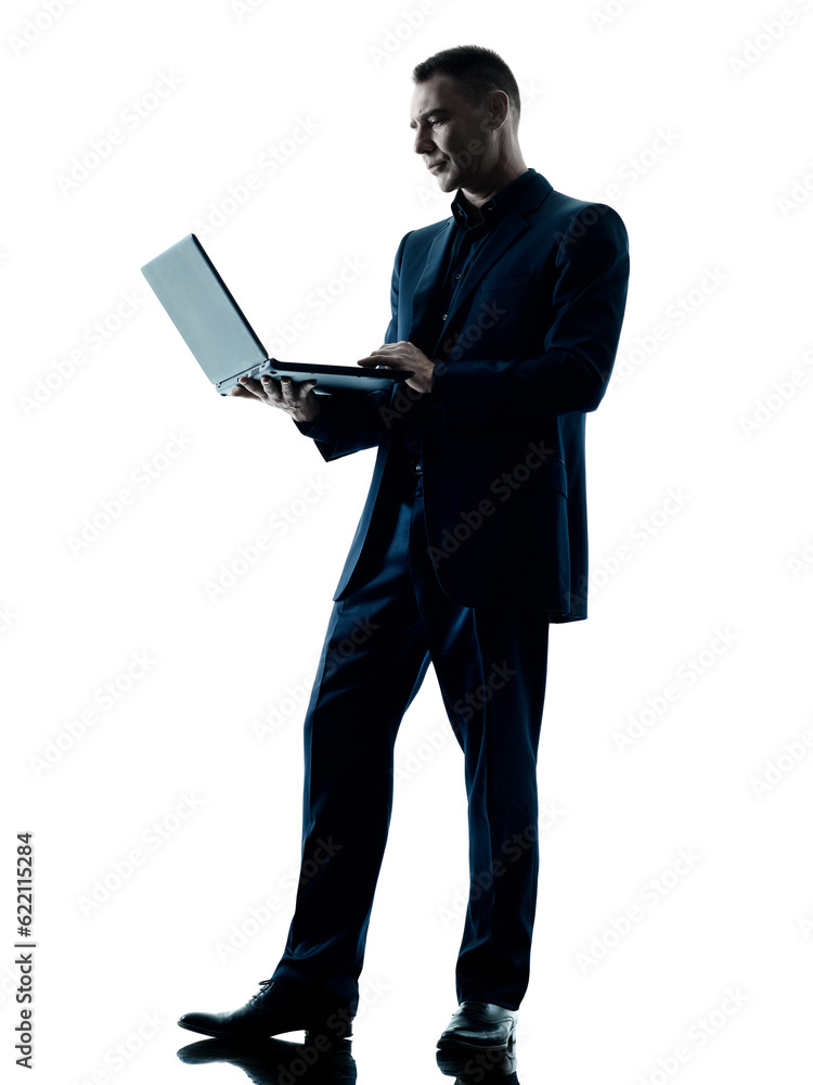 one caucasian business man computer laptop silhouette isolated on white background one caucasian business man computer laptop silhouette isolated on white background