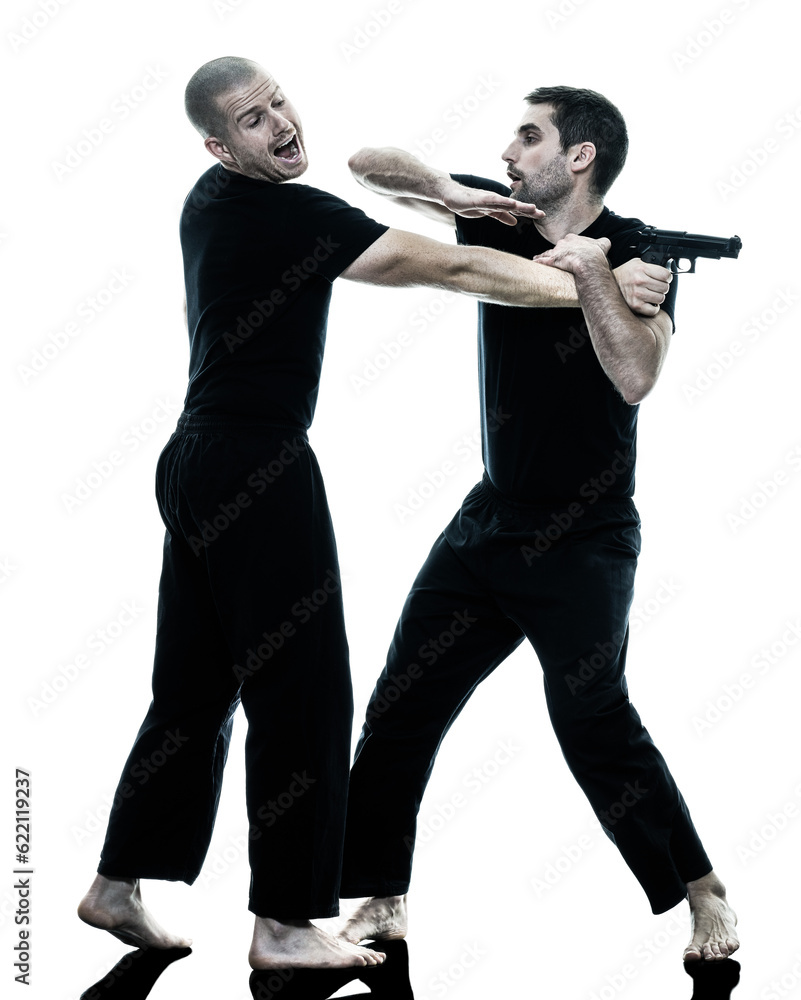 two caucasian men krav maga fighters fighting isolated silhouette on white background two caucasian men krav maga fighters fighting isolated silhouette on white background