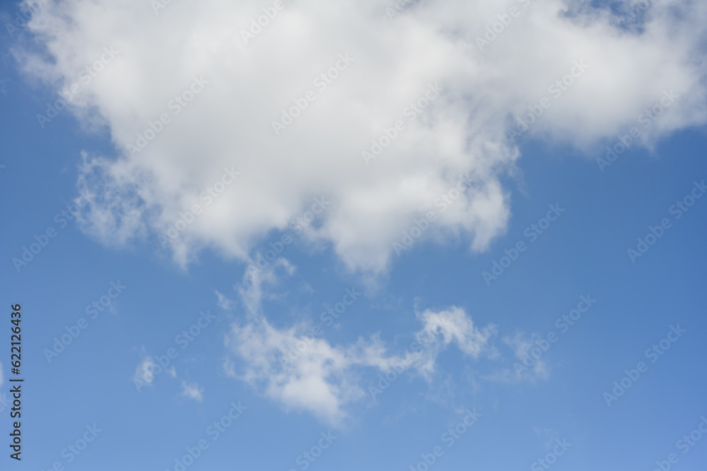 Big white fluffy cumulous clouds on blue sky Big white fluffy cumulous clouds on blue sky