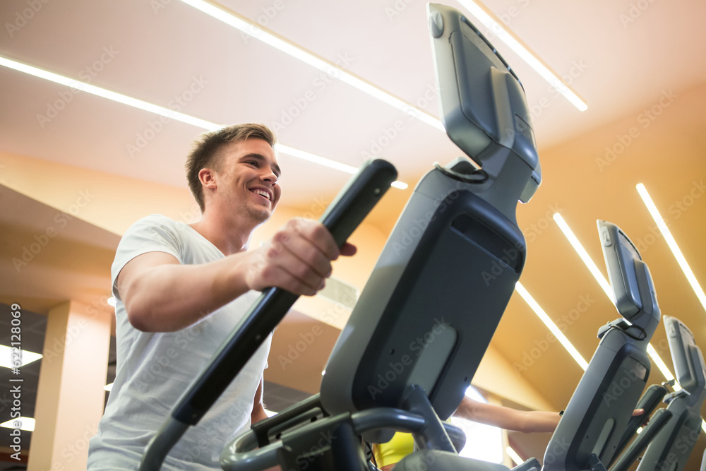 Smiling man on elliptical Smiling man on elliptical