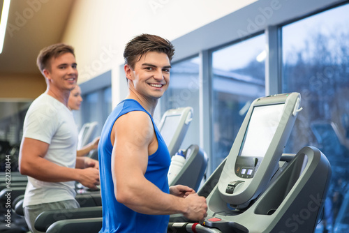 Smiling man on a treadmill